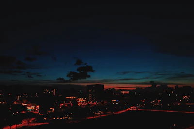 A cinematic frame showing a cityscape at dusk with vibrant colors.