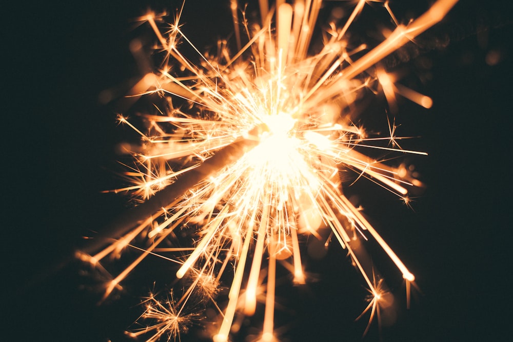 photo of lighted sparkler