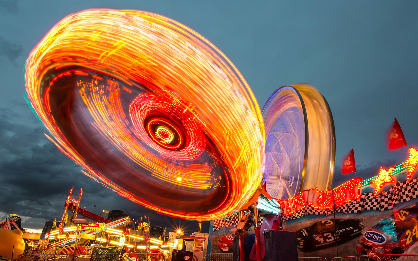 Canon EOS 5D Mark III + Canon EF 17-40mm F4L USM sample photo. Multicolored amusement park ride photography