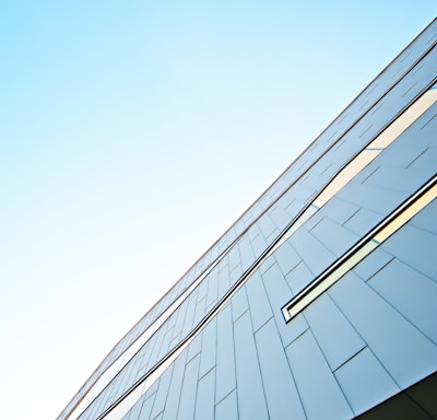 a tall building with a sky background