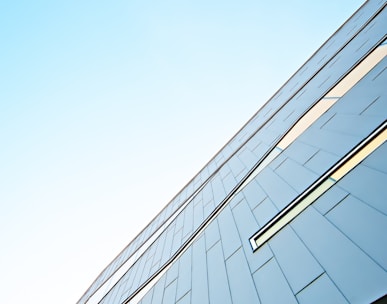 a tall building with a sky background