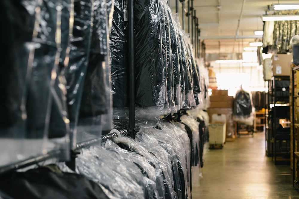 black suit hanging on rack