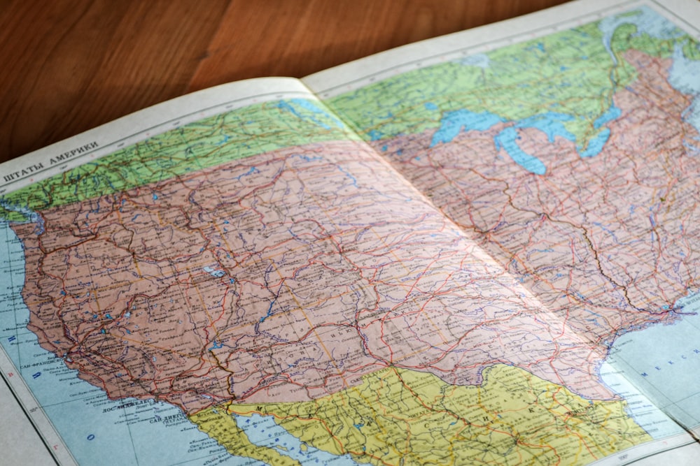 country map on brown wooden surface