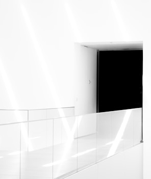 white wall paint with opened door