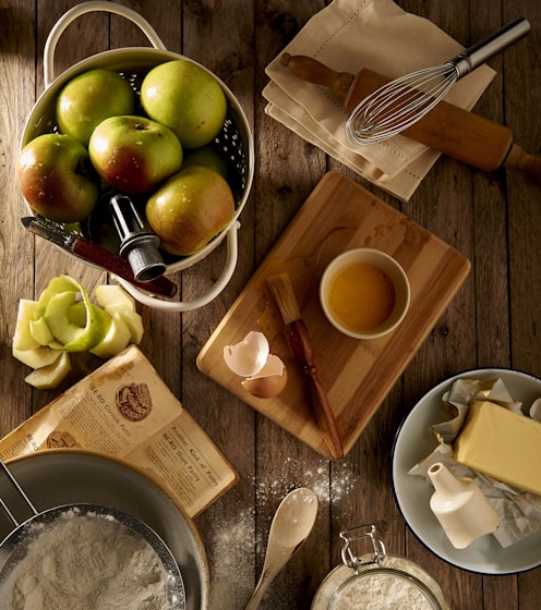 flat lay photography of mug on brown wooden chopping board