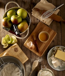flat lay photography of mug on brown wooden chopping board