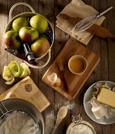 flat lay photography of mug on brown wooden chopping board