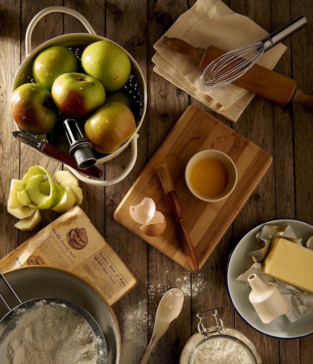 flat lay photography of mug on brown wooden chopping board