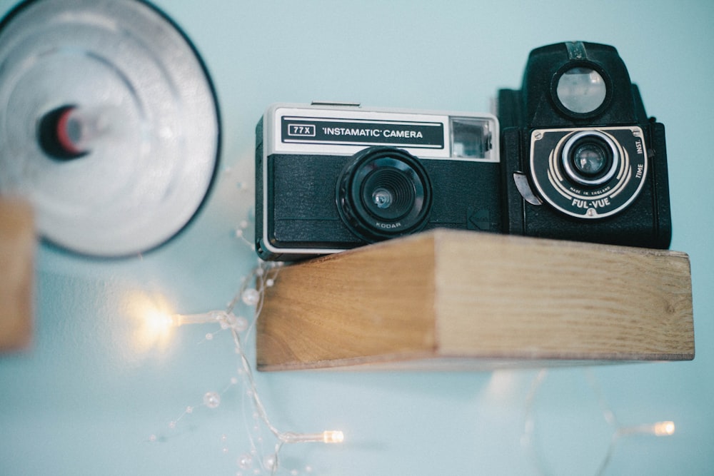 black and silver SLR camera