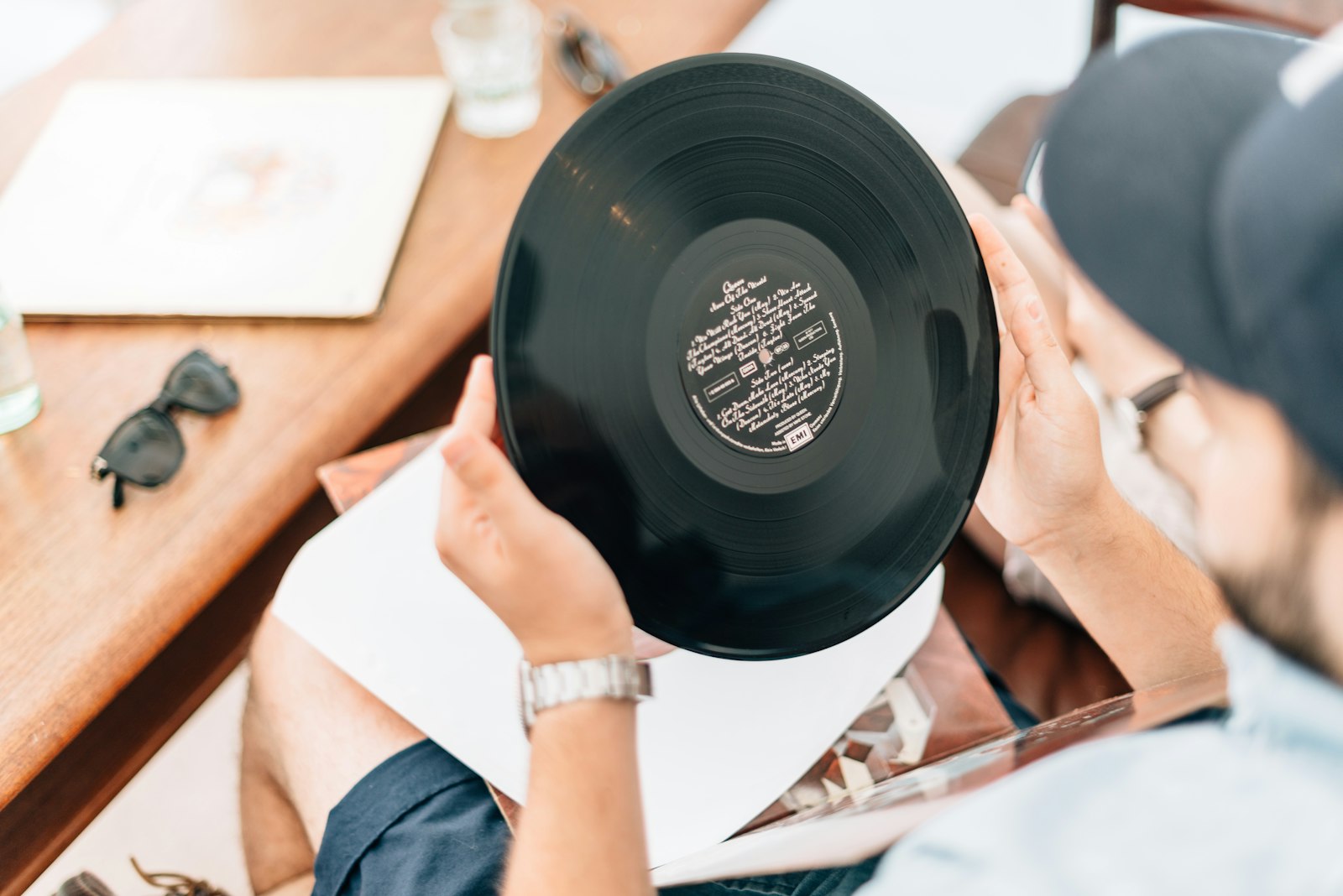 Nikon D800 + Nikon AF-S Nikkor 50mm F1.4G sample photo. Man holding vinyl record photography