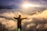 man facing clouds during golden time