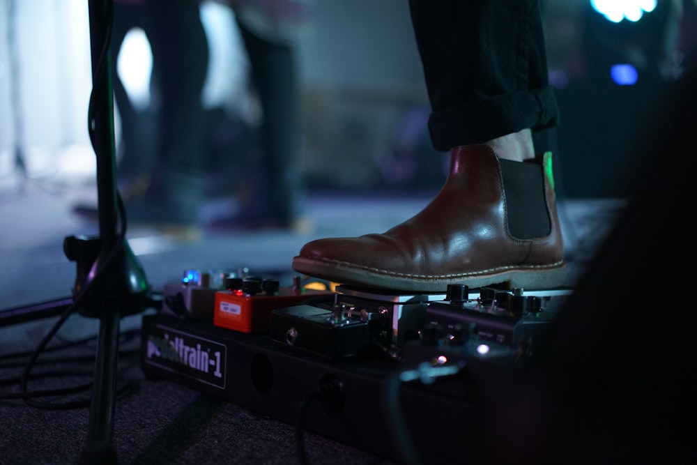 person wearing brown boots