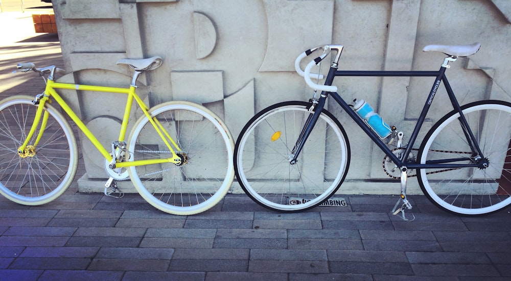 two fixie bicycles beside each other