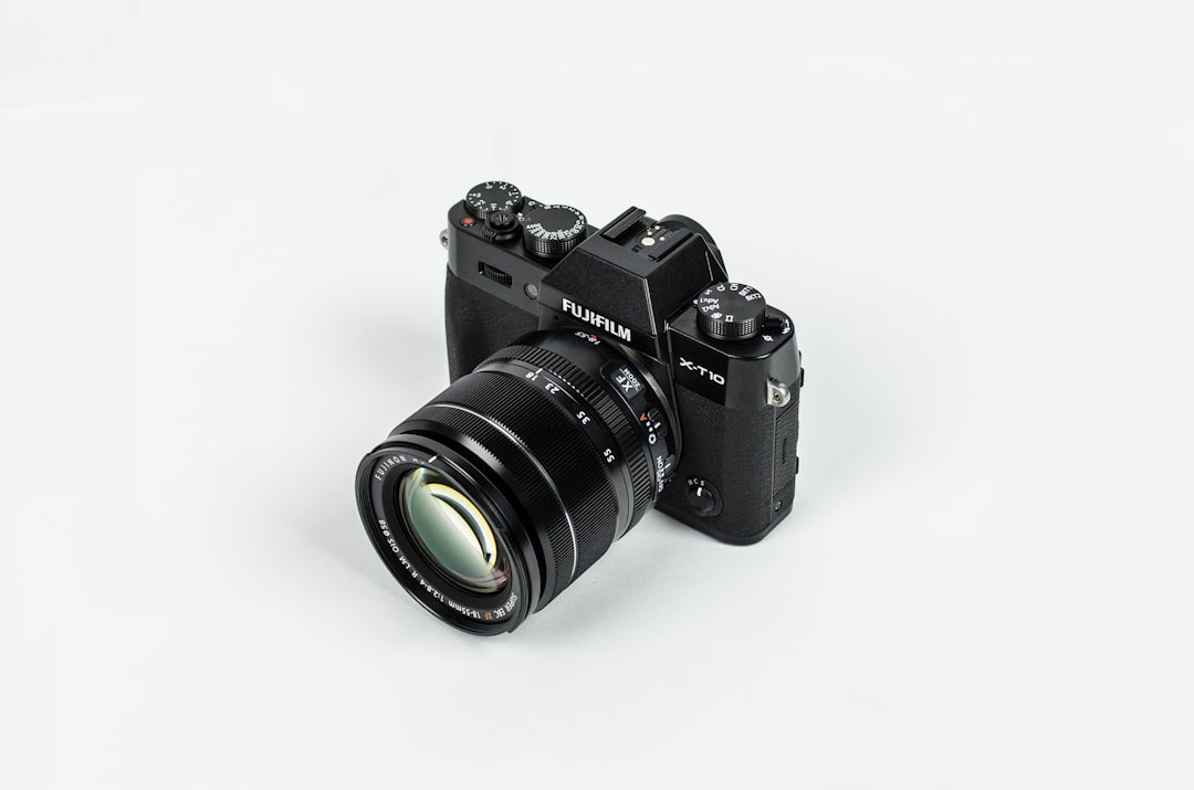 black Fujifilm bridge camera, Fujifilm X-T10