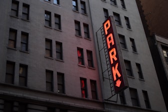 red Park light signage on gray concrete building