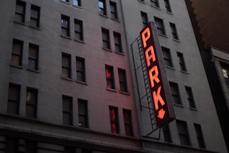 red Park light signage on gray concrete building