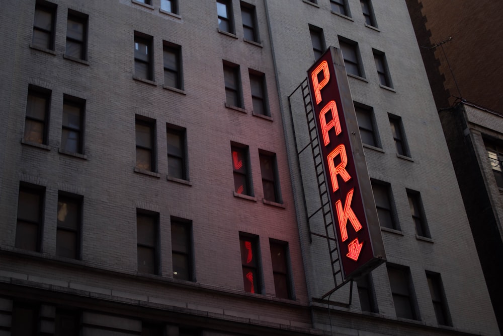 red Park light signage on gray concrete building