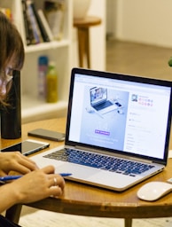 woman browsing on her laptop