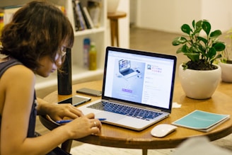 woman browsing on her laptop