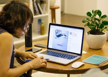 woman browsing on her laptop