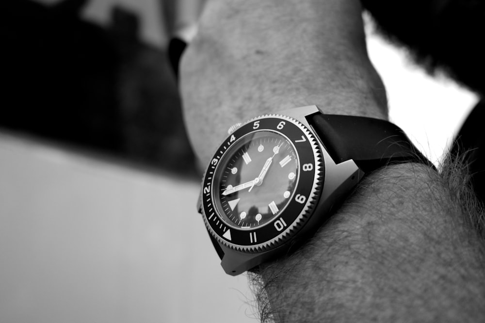 grayscale photography of analog watch