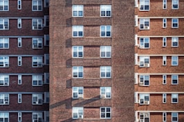 brown brick high-rise building