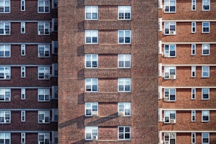 brown brick high-rise building