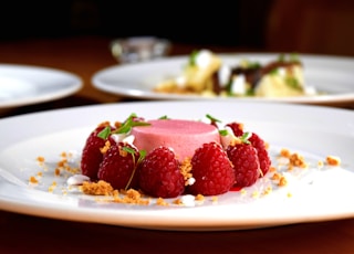 desert with red berries on plate