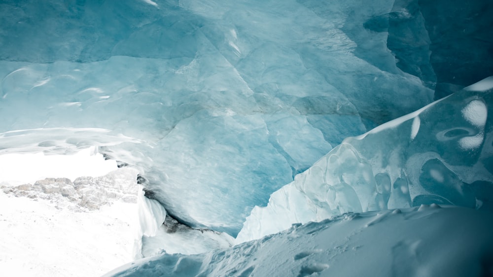 a large ice cave filled with lots of snow