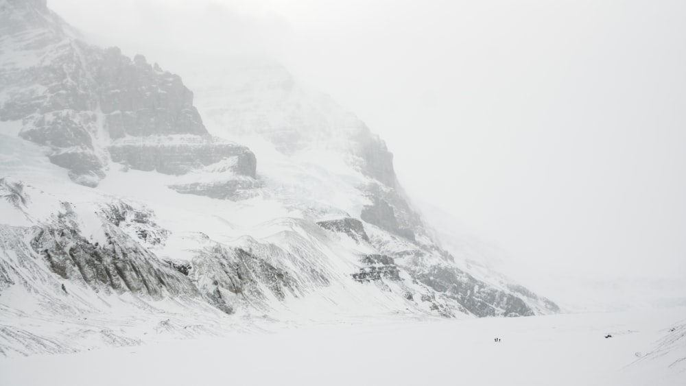 snow covered mountain during daytime