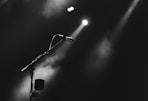 photo of microphone on foggy stage