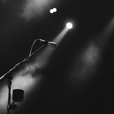 photo of microphone on foggy stage