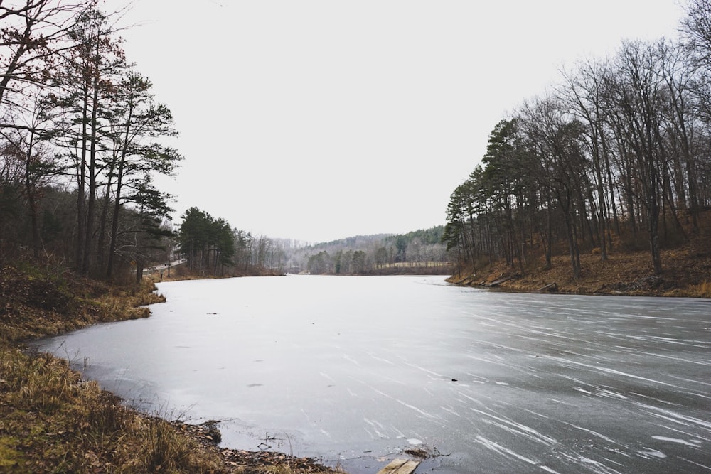 river under cloudy sky during daytime