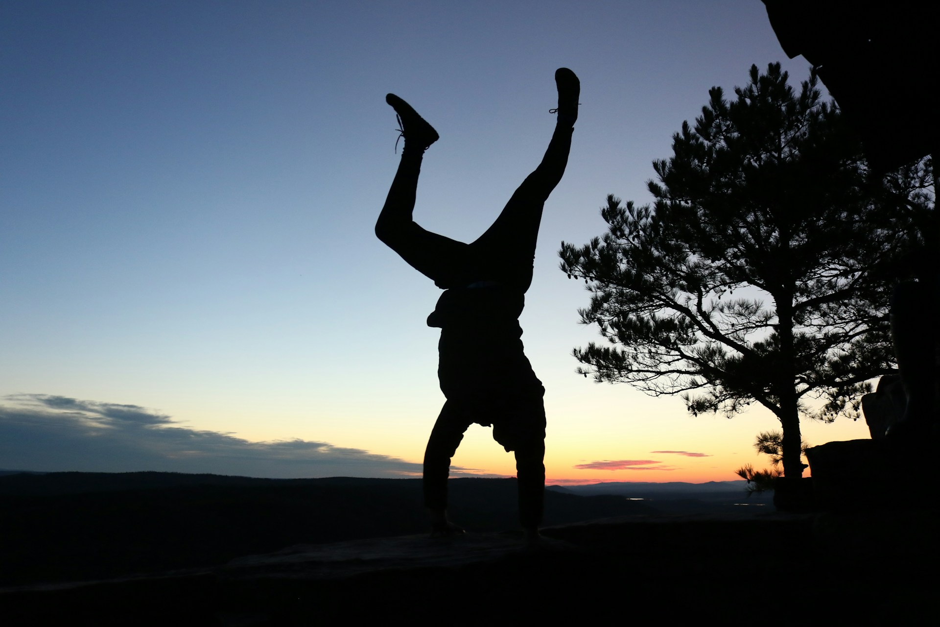 woman wearing yellow long-sleeved dress under white clouds and blue sky during daytime