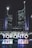 Tall, illuminated skyscrapers tower over a public square at night, with the word 'TORONTO' brightly lit in various colors at the forefront. Reflections of the lights shimmer on a wet surface below.