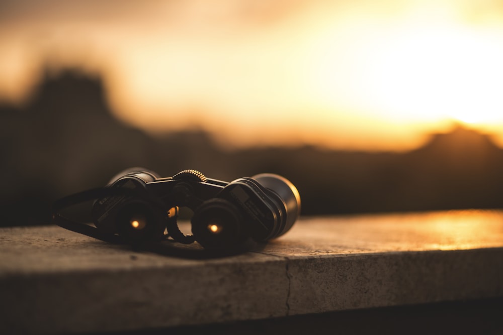 close-up selective focus photo of black binoculars