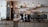 black kitchen appliance on kitchen island with pendant lights