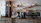 black kitchen appliance on kitchen island with pendant lights