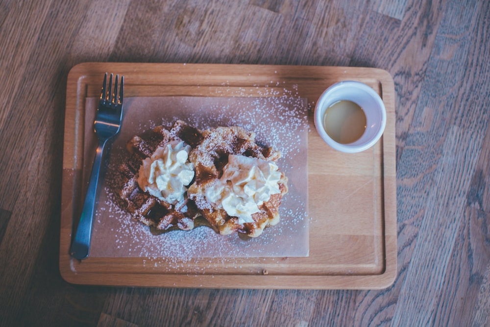 sugar glazed waffle topped with cream