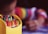 selective focal photo of crayons in yellow box