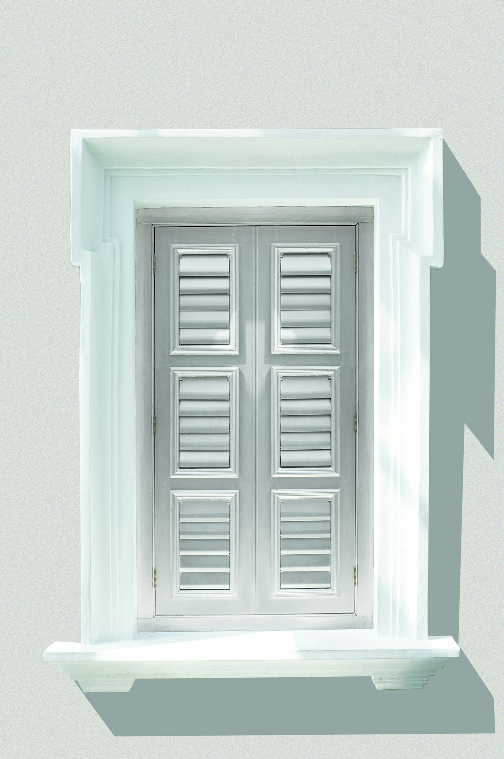 white wooden window shutter