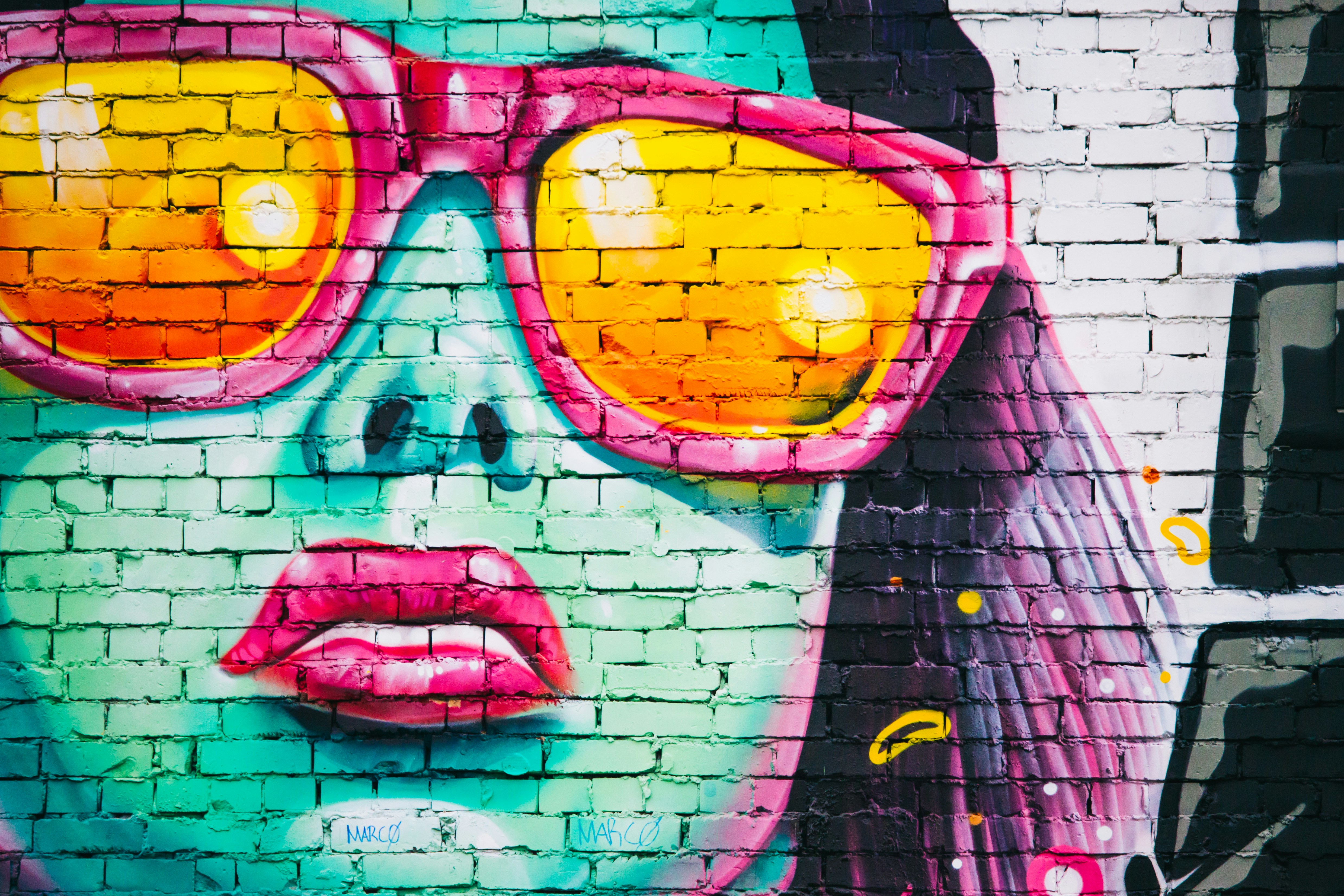 Mural of woman’s neon face