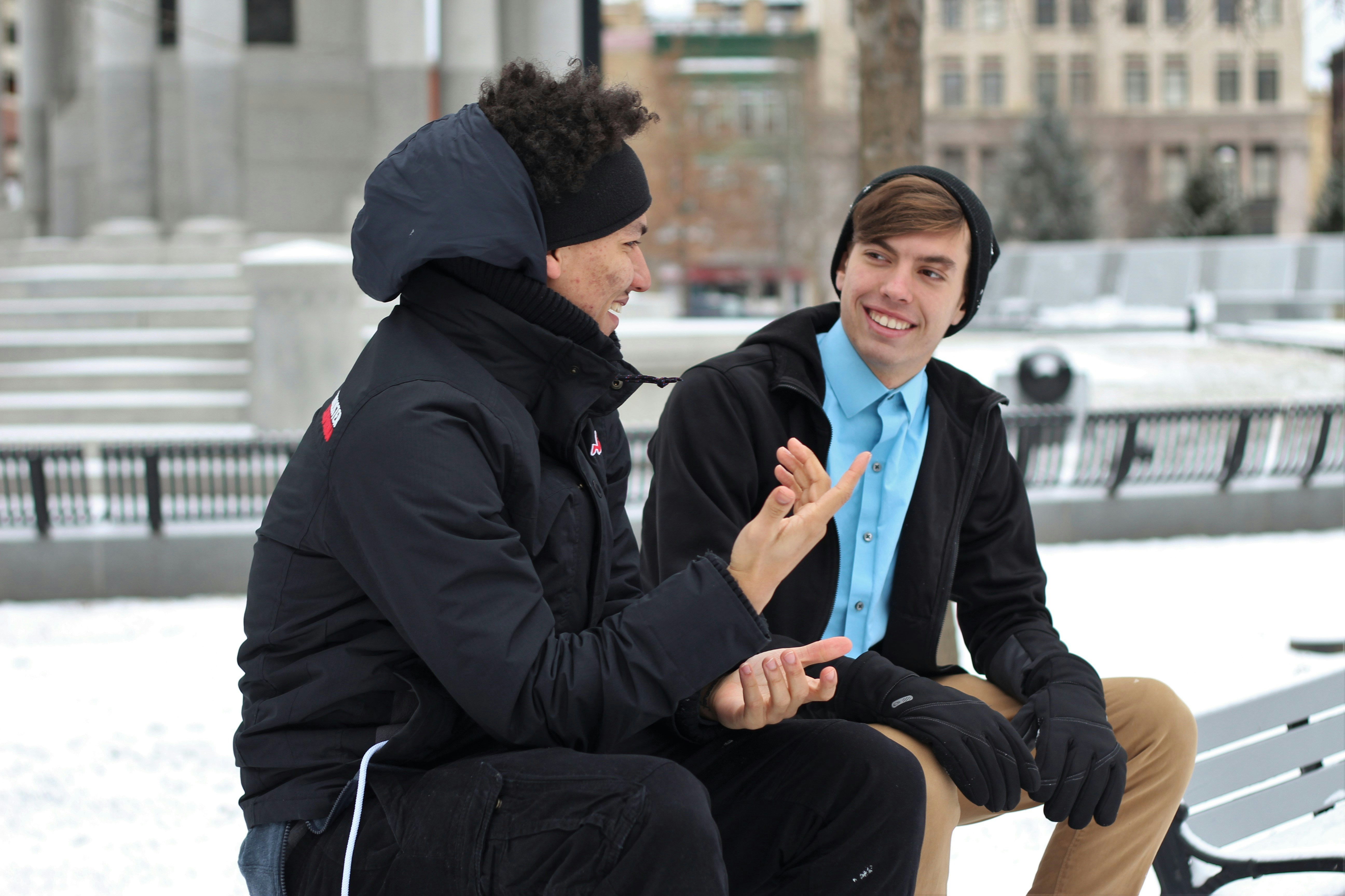 Men talking in the cold