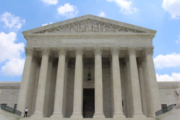 Photo of the supreme court in Washingon, DC. Credit: Claire Anderson https://unsplash.com/photos/Vq__yk6faOI