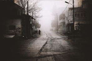 A foggy, deserted southern street evoking the mood of Michael's suspense stories.