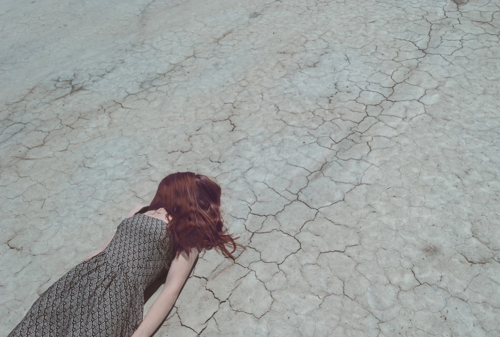 woman lying on ground