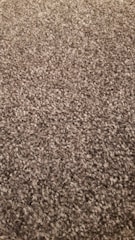 A close-up of a beautifully textured flooring material.
