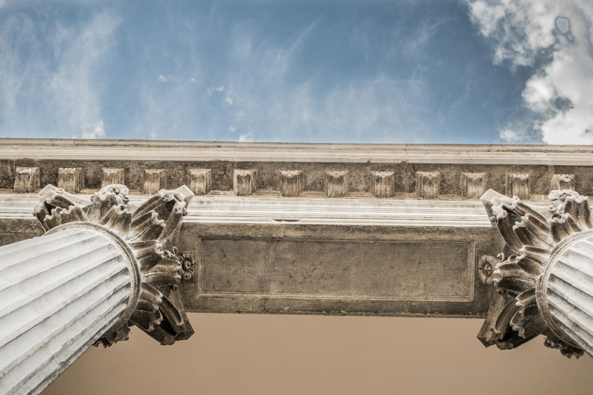 Classical stone column capitals on a courthouse facade