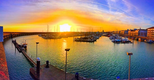 boat lot on body of water in Brighton Marina United Kingdom