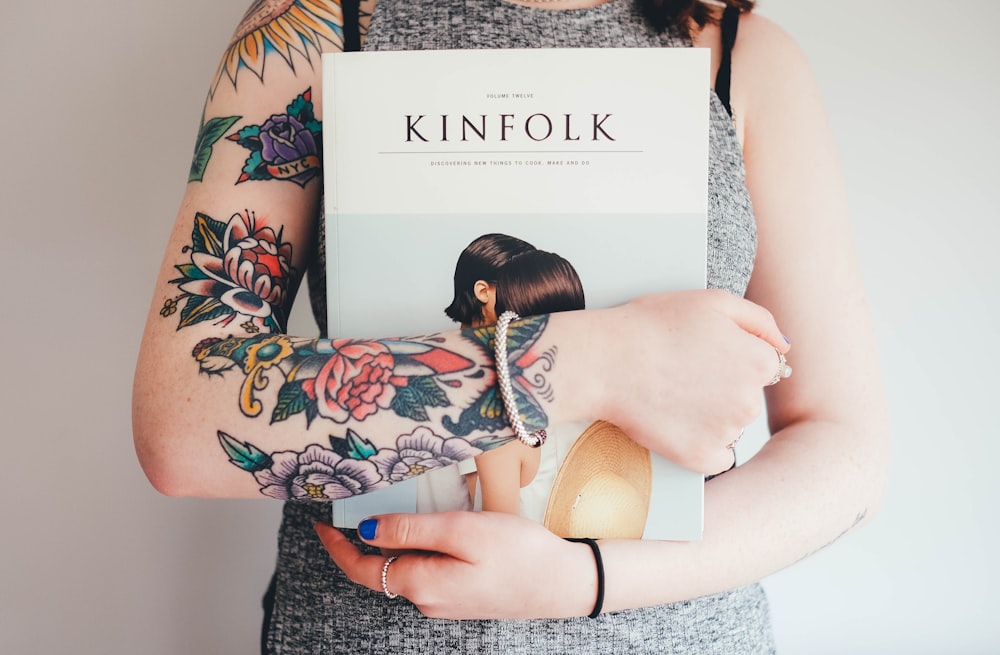person holding Kinfolk book